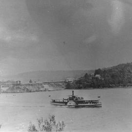 Paddle-steamer Telephone on route to Parkesvale from Como, with railway bridge in the background, ca. early 1900s