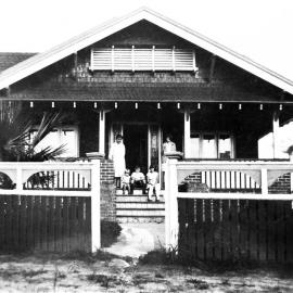 Brinsley residence at 102 Toronto Parade, Sutherland, with family group on front verandah, ca. 1930s
