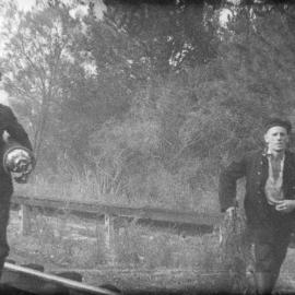 Brinsley family members fighting fire at Royal National Park, ca. 1940s