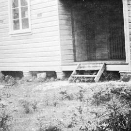 Kurnell Public School students and teachers with view of the schoolhouse, ca. 1921