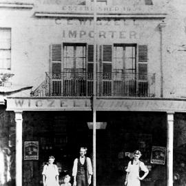 Wigzell family members in front of hairdresser shop, Oxford Street Sydney, ca. 1880s