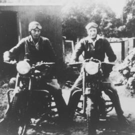 Bill and Norman Phelps on motorbikes in the garden of a house in Avenel Road, Gymea, 1946