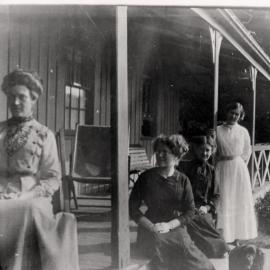 Four females on a verandah, 1910