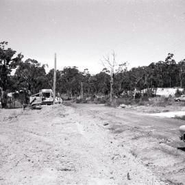 Bulldozer at a building site in Bruce Road, Bangor, ca. 1970s