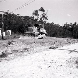 Bulldozer working on new road, off Bruce Road, Bangor, ca. 1970s