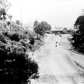 Walking up a road in Como, ca. 1920s 
