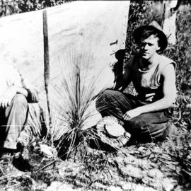 Les Stenhouse with his brother collecting grass tree gum, Jensen's gully, Woronora, 31 July 1929 