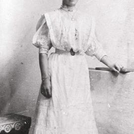 Young woman dressed in nineteenth century costume, ca. 1920-1940 