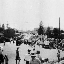 Procession in progress looking north along Gerrale Street, Cronulla, ca. 1920s