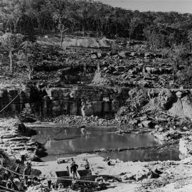 Woronora Dam under construction, view of excavation work on the northern side, ca. 1928