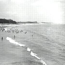 Cronulla Beach South, view looking north with swimmers in the surf, ca. 1930