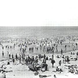 Cronulla Beach South, view of sunbathers on the sand and swimmers in the surf, ca. 1930