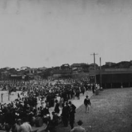 Cronulla Beach South, view looking south with surf carnival in progress on the beach, c. 1922-1926