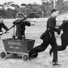 Cronulla Fire Brigade members participating in a drill at Katoomba, 1939
