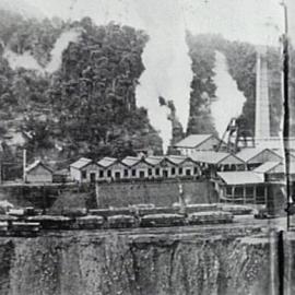 Helensburgh Coal Mine, view of exterior buildings and transportation train in foreground, ca. 1905