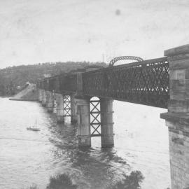 Como Railway Bridge with boat on the water, ca. early 1900s