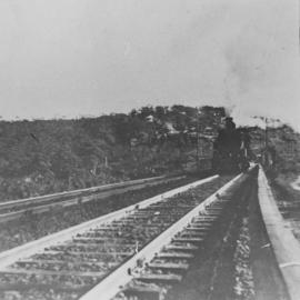 Goods train approaching Como level crossing, 1926
