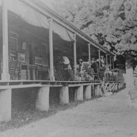 The Rest accommodation house at Audley with visitors sitting on the verandah, 1909